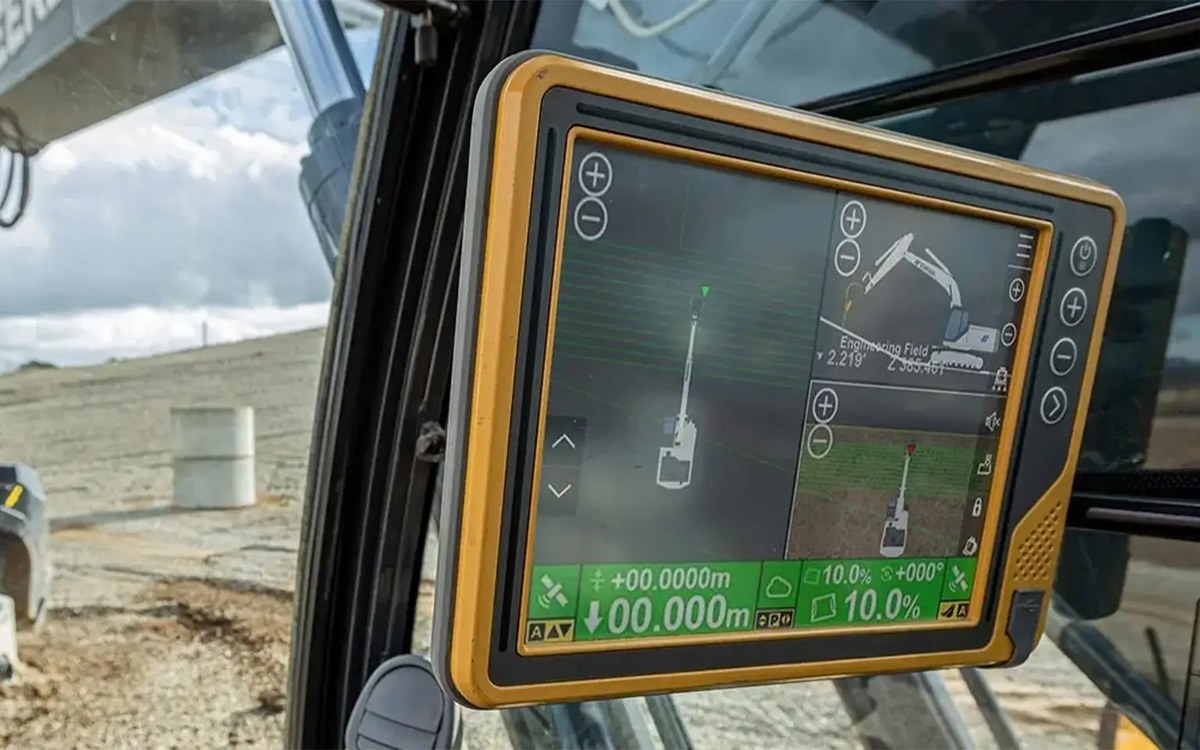 In-cab machine-control display showing excavator grade guidance during earthwork