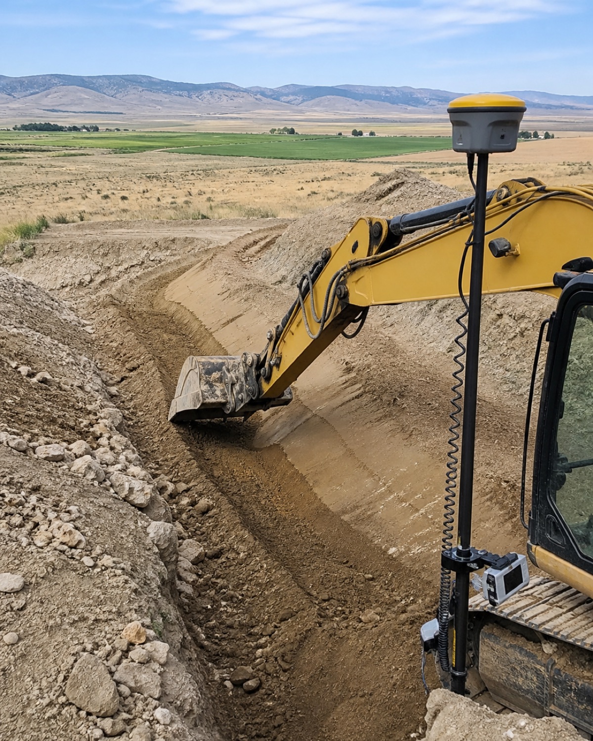 Regional construction terrain and GPS equipment near Riverton, WY